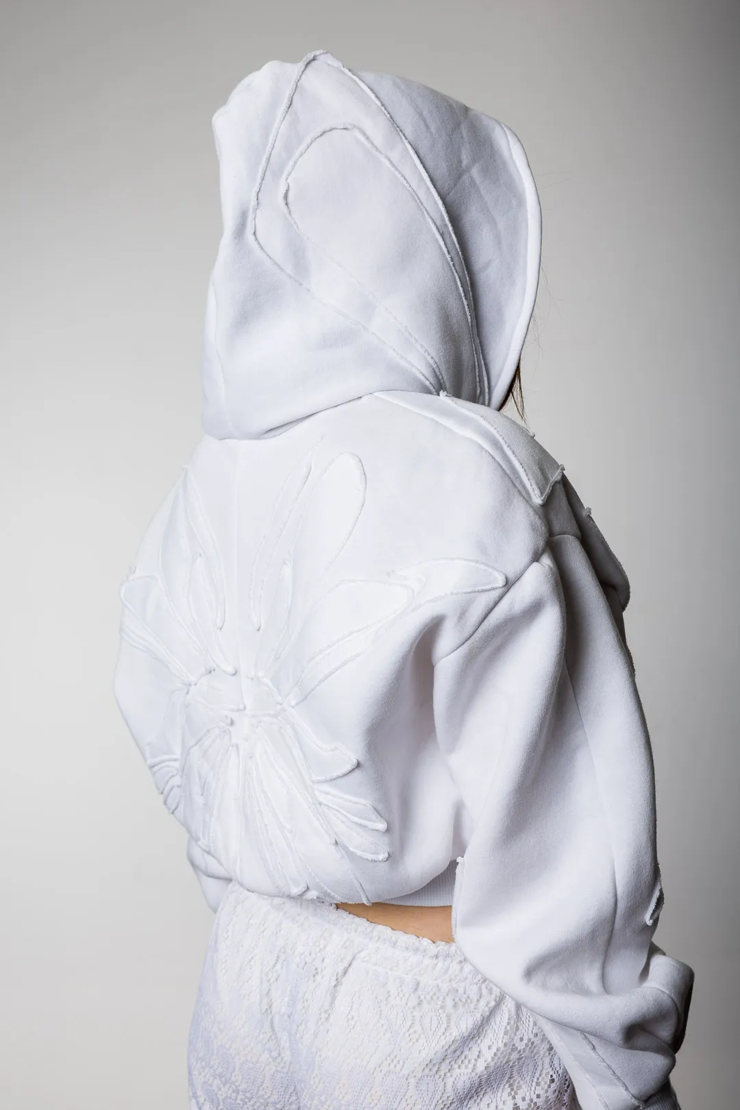 White custom Levacher hoodie seen from the back